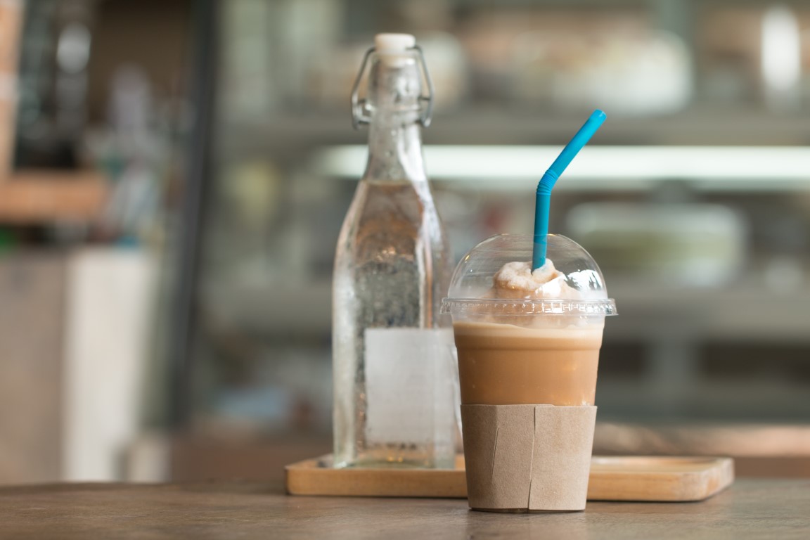 Coffee,With,Ice,Capucino,Frape,Cup,Drink,On,Wooden,Desk